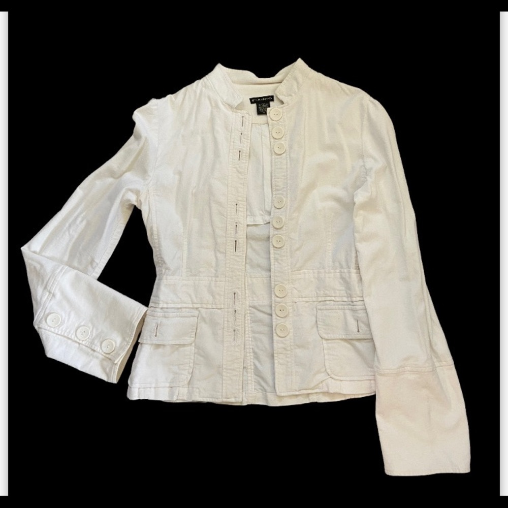 This item is in excellent condition. Never been wore size small in cream white